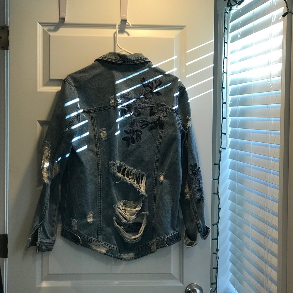 Distressed jean jacket